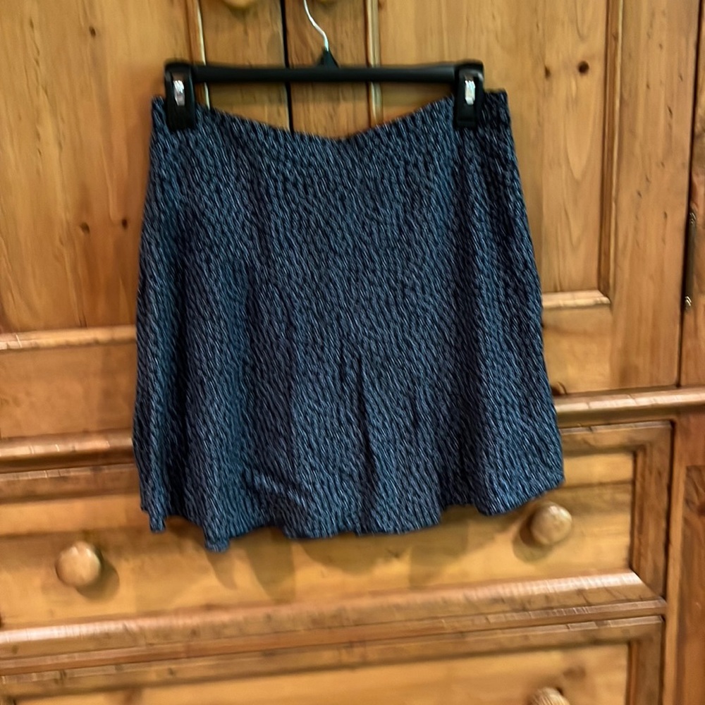 H&M navy skirt with white floral pattern